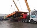 Six-line Kamag transporter is lifted on truck