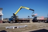 Tidewater's PM loader crane picks up wallboard