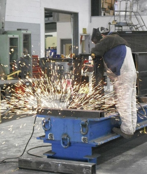 A certified welder on the job at one of Wheco's workshops