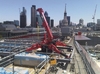 A URW-706, the larger crane in the Unic spider range, installing equipment from the roof of the One New Change retail development in the City of London